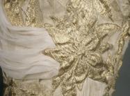 Gold brocade evening dress with beige silk chiffon scarf