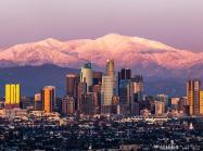 la skyline in front of mountains 