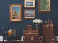 travel trunks and paintings