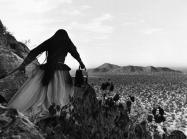 Graciela Iturbide, Angel Woman, Sonora Desert, Mexico, 1979 (printed later). Gelatin-silver print.