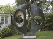 View of "Two Forms (Divided Circle)" in garden at Hepworth Museum