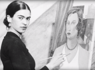 Frida Kahlo working on a painting