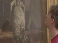 man stares at detail of The Wedding Feast at Cana