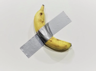 Artist Maurizio Cattelan's duct taped banana to a wall