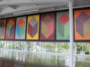 Sol LeWitt’s Seven cubes with color ink washes superimposed.