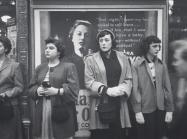 women waiting on the street