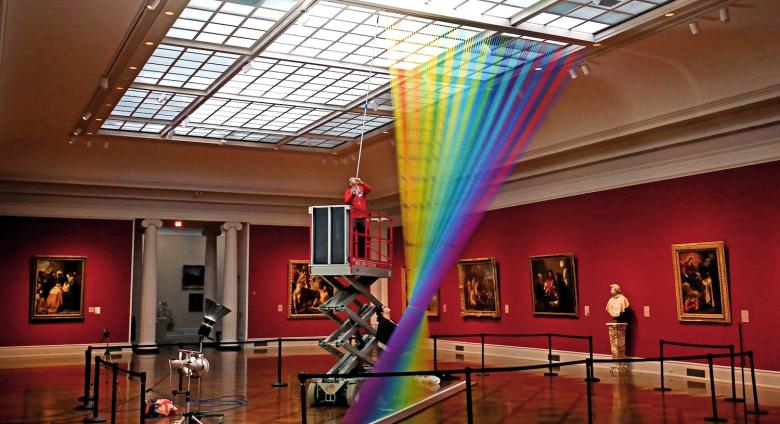 Gabriel Dawe with his installation at Toledo Museum of Art