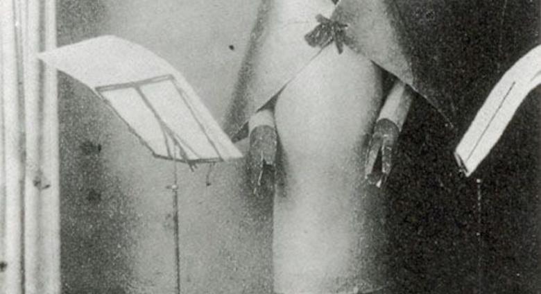 Hugo Ball, reading "Karawane", Club Voltaire, 1916 Courtesy Wikimedia