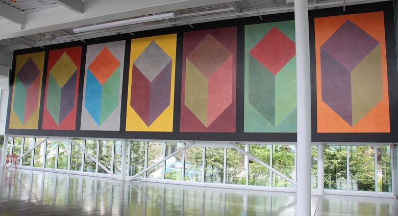Sol LeWitt’s Seven cubes with color ink washes superimposed.