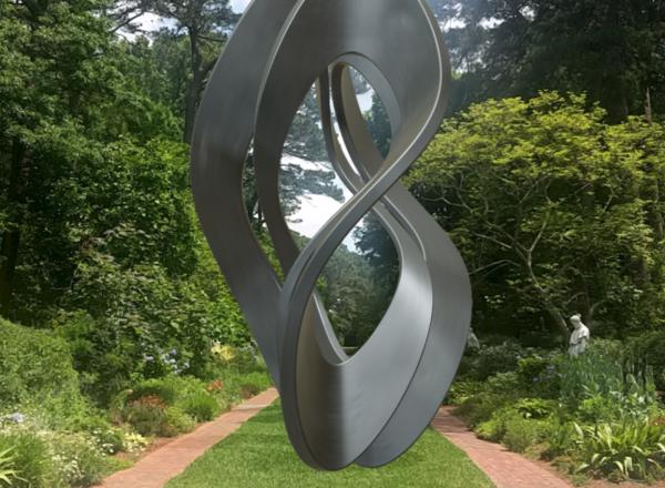 a photo of a large metal sculpture in a twisted organic form in a lush garden setting
