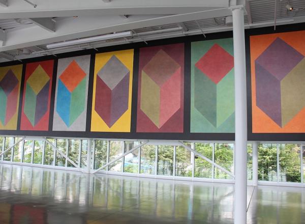 Sol LeWitt’s Seven cubes with color ink washes superimposed.