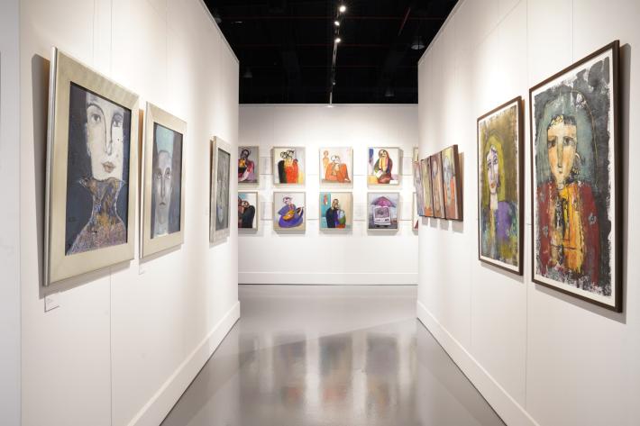 Images of Alfarsi artwork on gallery walls
