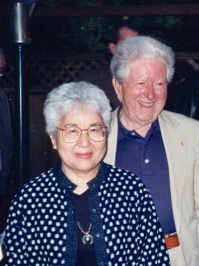 Couple cheerily walking together