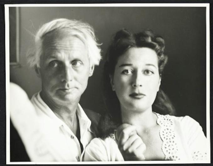 couple posed in headshot, black and white