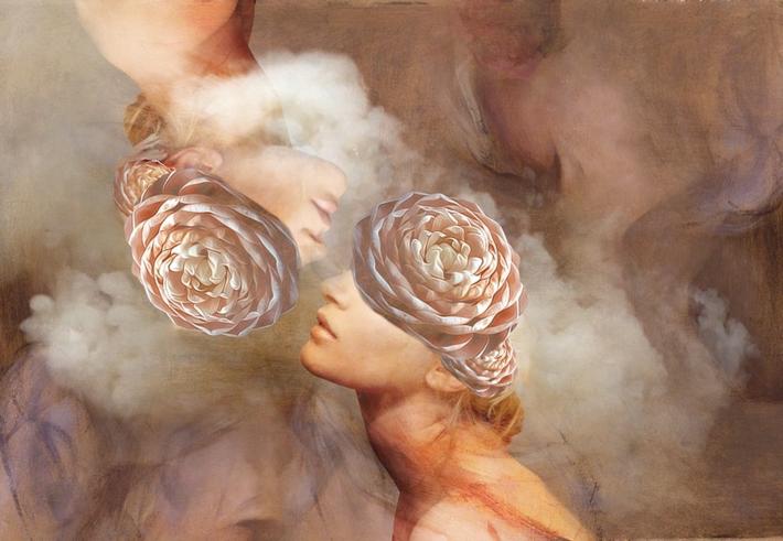 two faces with smoke and flowers 