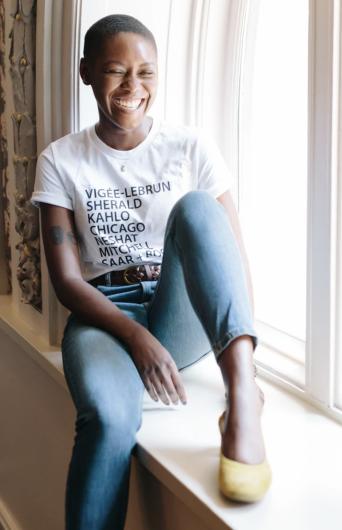 woman wearing artist list shirt